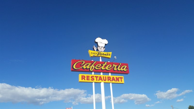 Highway sign for Chef Bernie's in Farmington, New Mexico.