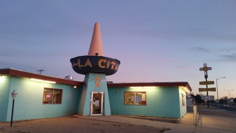 A vintage Mexican restaurant with a sombrero on the roof on Route 66 in Tucumcari, New Mexico, a classic road trip in the Southwest of the United States.