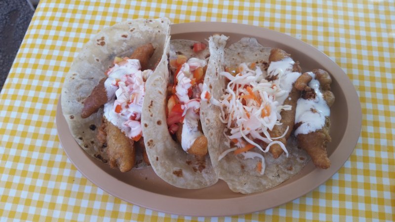 A plate of fish tacos on a gingham tablecloth at Taquitos Del Valle, Loreto, Baja Sur, Mexico.
