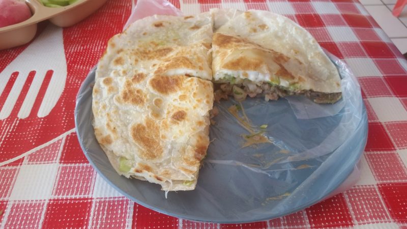 A mulita filled with beef and cheese on a plate in Guerrero Negro, Baja California Sur, Mexico.