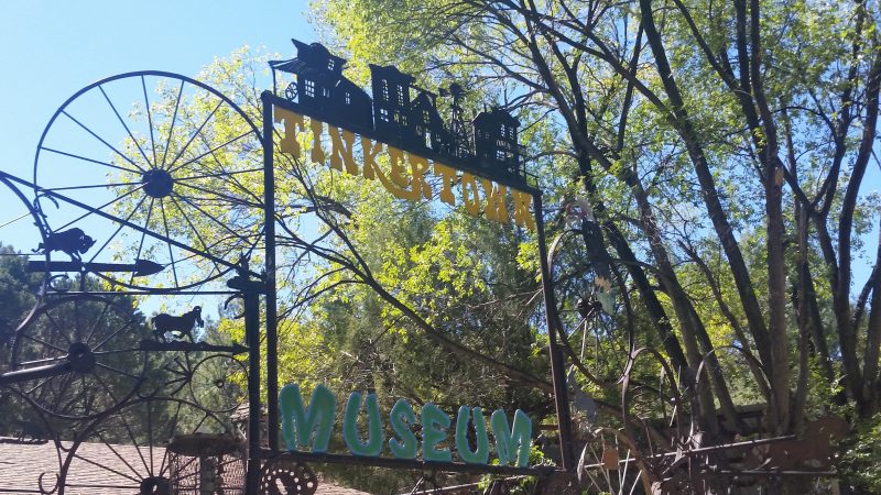 A stylistic sign for Tinkertown Museum, one of the more quirky day trips from Albuquerque.