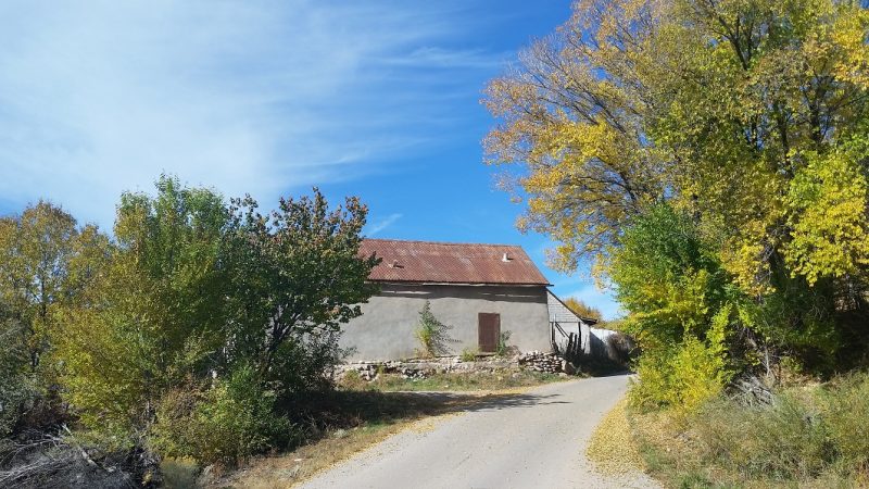 An old barn in autumn in New Mexico on the High Road to Taos Scenic Byway