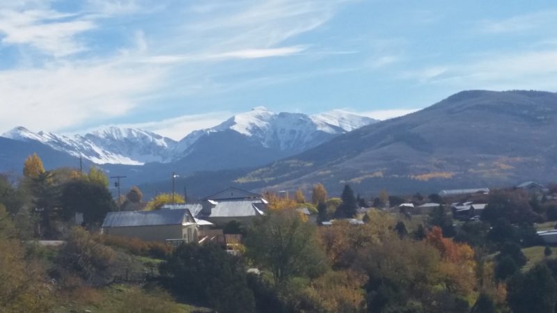 Truchas, New Mexico with the snow covered Pecos Mountains beyond.