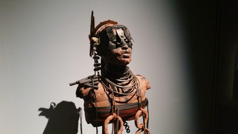 A stylized, industrial-looking terracotta figure from artist Rose B. Simpson on display at Museum hill in Santa Fe.