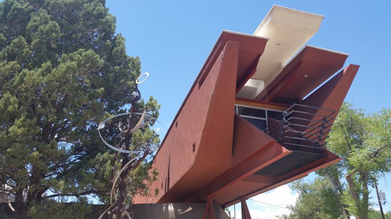 An unusual box-like house designed by Bart Prince in a residential neighborhood in Albuquerque, New Mexico.