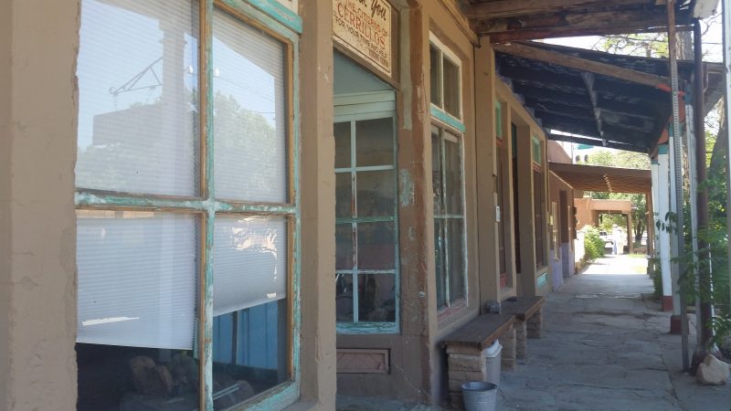 Several old shopfronts in the town of Los Cerrillos on New Mexico's Turquoise Trail.