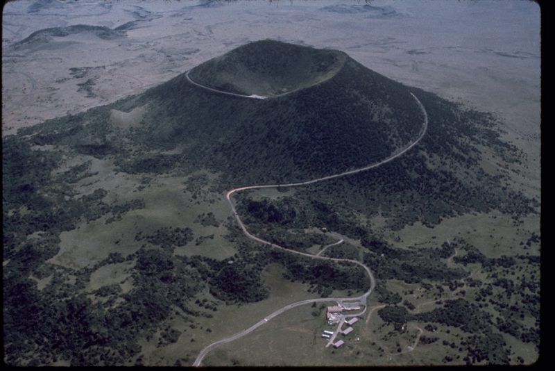 Aerial view of a road winding around Capulin Volcano in New Mexico.