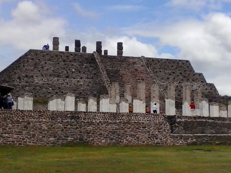Large stone pyramid with white pillars at Tula in Mexico.