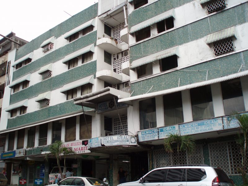 Exterior of the green and white Hotel ideal in Panama City, Panama.